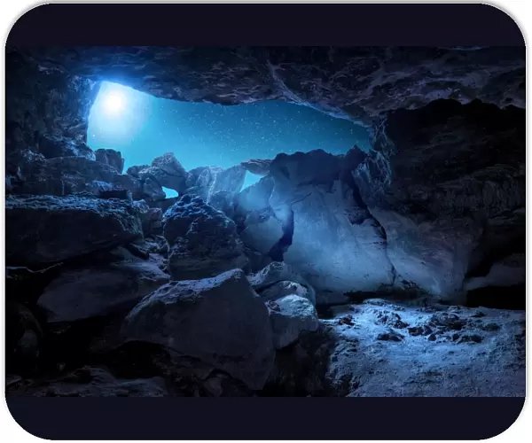 Blue Moon. Cave Moonbeams illuminating through an old Indian Cave on the