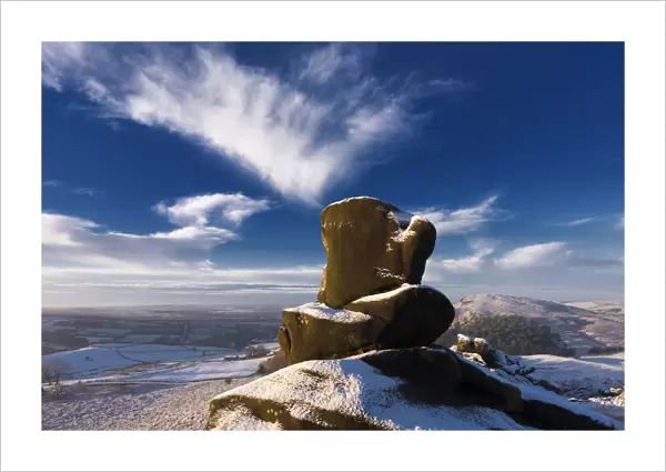 Loaf and Cheese rock in the snow on Ramshaw Rocks. located between Buxton and Leek in the Peak District