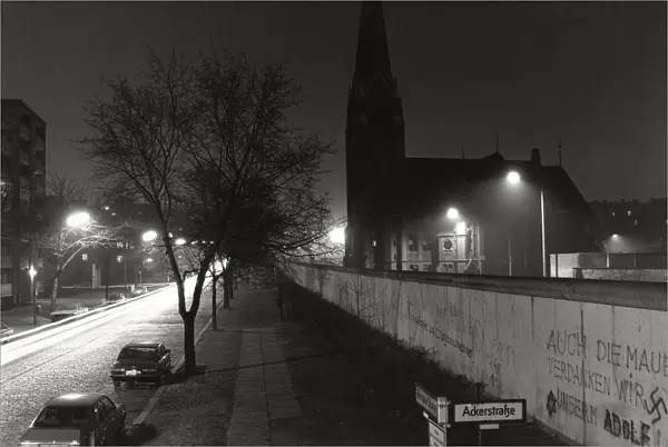 View over the Berlin Wall in the winter of 1985, Bernauer Strasse with the Church