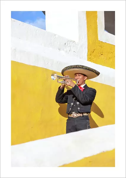 Mariachi man playing trumpet, Izamal, Mexico