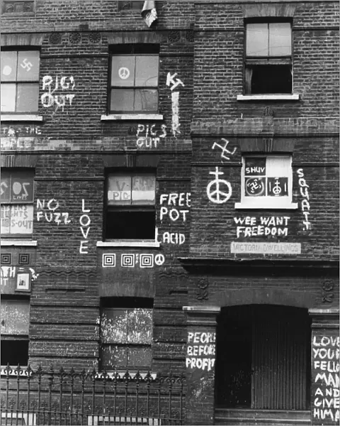 Graffiti. circa 1970: Anti-police and pro-drugs graffiti on the walls of