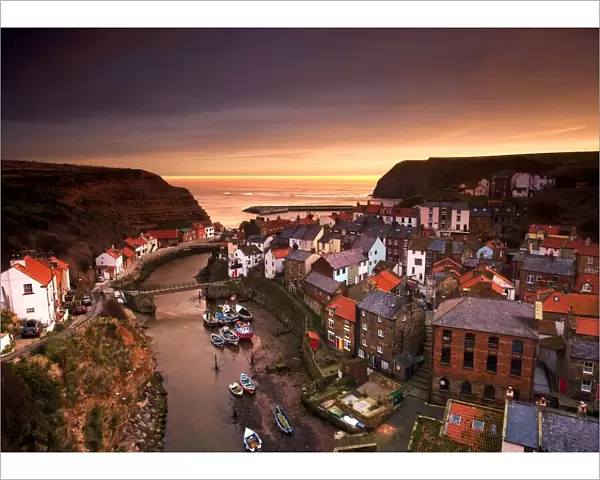 Cityscape at sunset, Staithes, Yorkshire, England