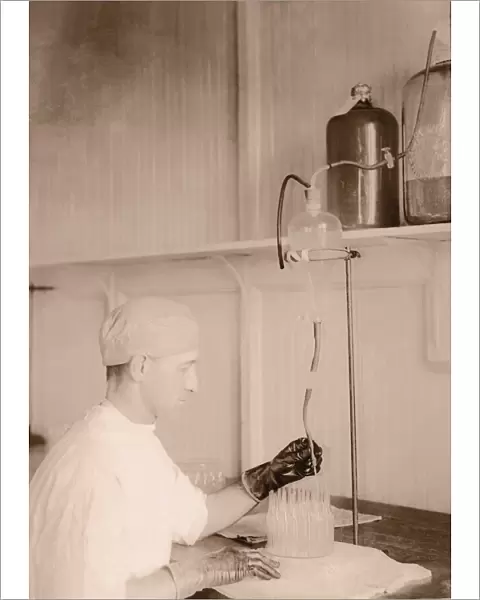 Man working in laboratory (B&W sepia tone)