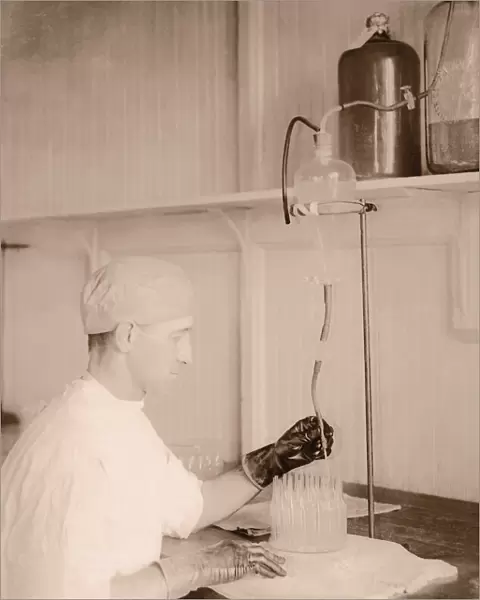 Man working in laboratory (B&W sepia tone)