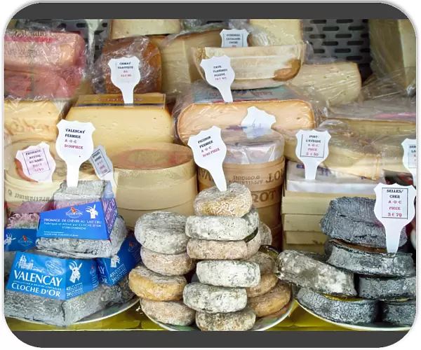 Cheese stall in market in Pas-de-Calais, northern France, selling inter al. Pont