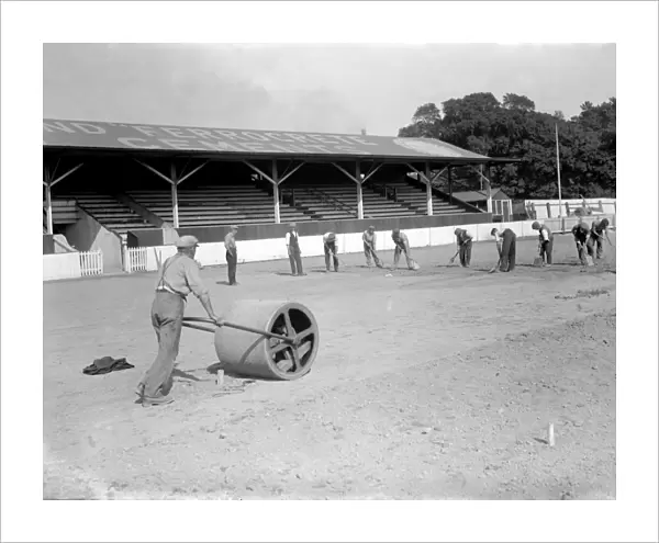 Groundsmen at work on the Northfleet Football ground. 1935