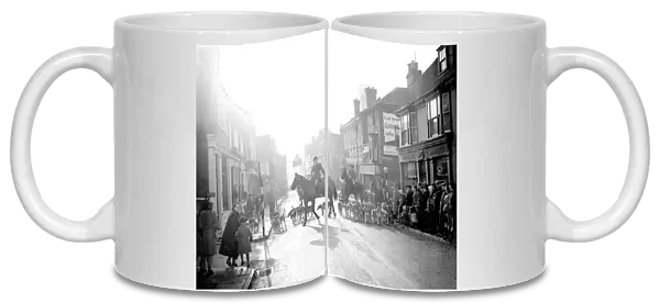 3 December 1952 Leading the fox hunt through Edenbridge High Street. Edenbridge