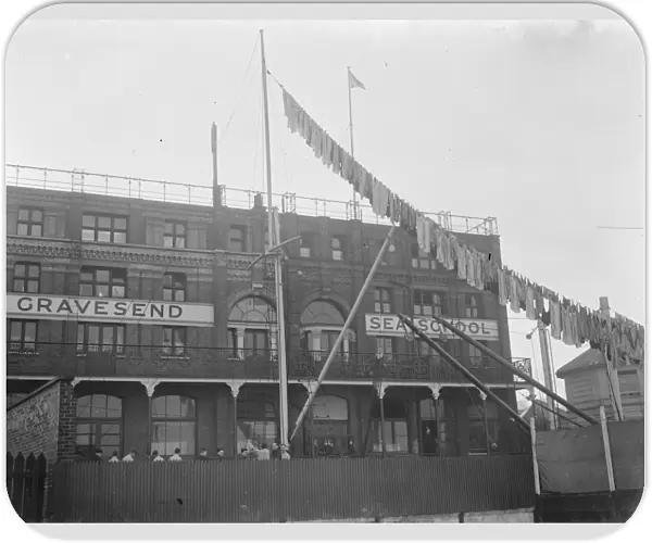 Washing is hanging from the mast at Gravesend Sea School in Kent. 1939