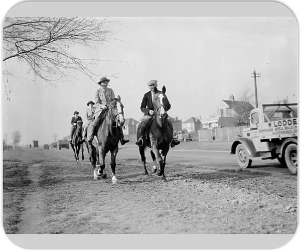 Horse riders on a road in Bexley, London 1938