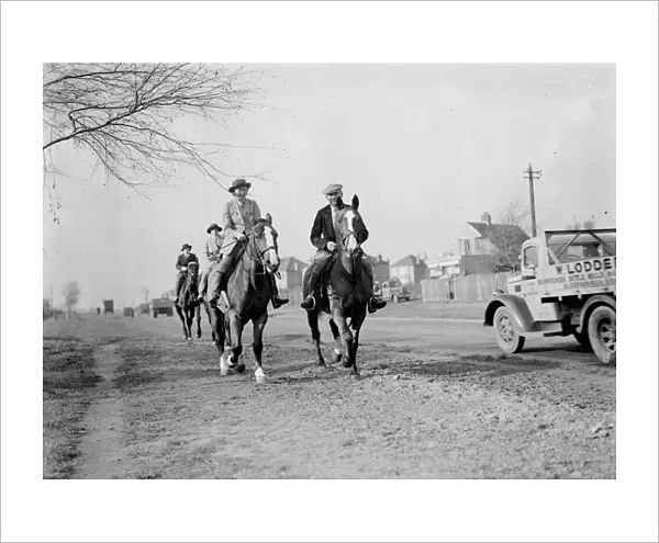 Horse riders on a road in Bexley, London 1938
