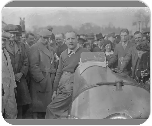 John Cobb breaks Brooklands lap record. Mr John Cobb, driving the 400 hp Napier Railton car