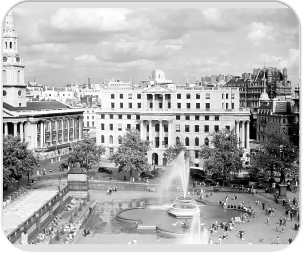 Trafalgar Square with St Martin - in - the - Fields Church to left, London, UK