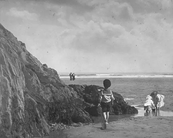 Children on beach at Perranporth, Perranzabuloe, Cornwall. Early 1900s