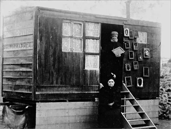 Samuel John Goviers father, Samuel Govier, and his mother, Annie, in the doorway of his photographic van, Cornwall. Early 1900s