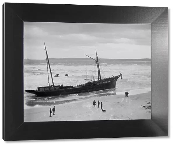 The wreck of the collier Bessie, with all that remains of the wrecked Vulture in the surf beyond, Carbis Bay, Lelant, Cornwall. 1893