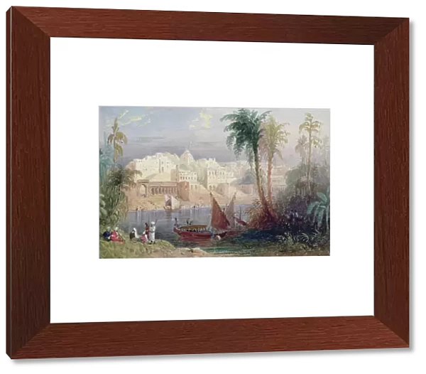 A View of an Indian city beside a river, with boats on the river and figures in the