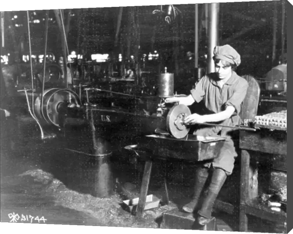 Woman broaching key seat in front sight carrier for rifle, Eddystone Rifle Plant, Eddystone, Pa