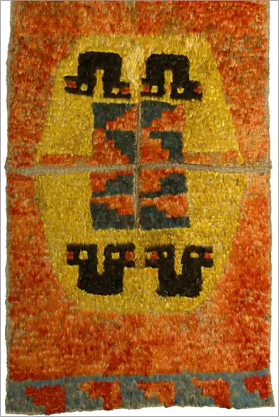 A Nazca-Huari feather tunic, c. 700-1100 (cotton, feathers)