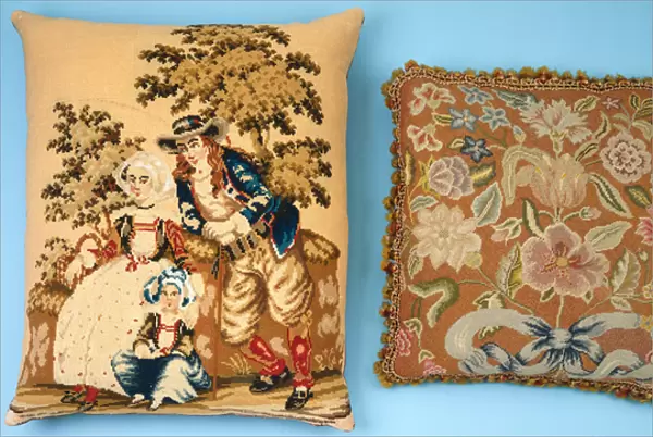 Two cushions with needlework panels worked in coloured silks & wools (silk, wool)