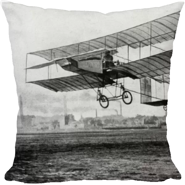 Henri Farman (1874-1958) at Issy-les-Moulineaux in his plane the Voisin-Farman 1