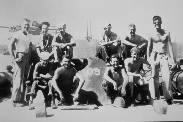 Lieutenant John F. Kennedy with the crew of his patrol torpedo boat PT-109
