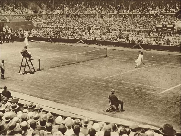 Suzanne Lenglen and Kitty McKane at work on the famous courts at Wimbledon (b  /  w photo)