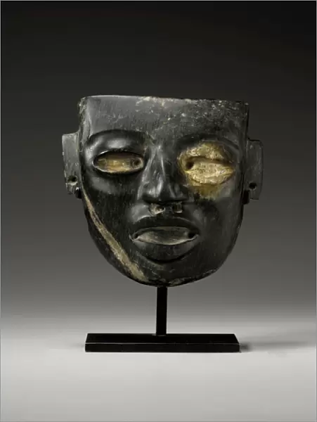 A Teotihuacan stone mask, carved with the youthful face of a dignitary, c. 450-650 (stone)