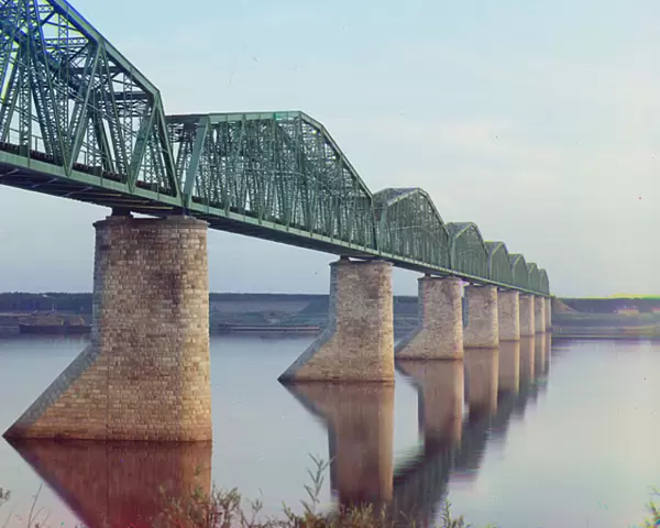Trans-Siberian Railway metal truss bridge on stone piers