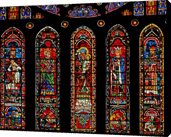 Figures beneath the north rose window: Melchisedek, David, St Anne, Solomon