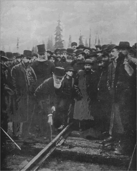 Lord Strathcona driving the last spike of the Canadian Pacific Railway at Craigellachie, 7 November 1885 (b  /  w photo)