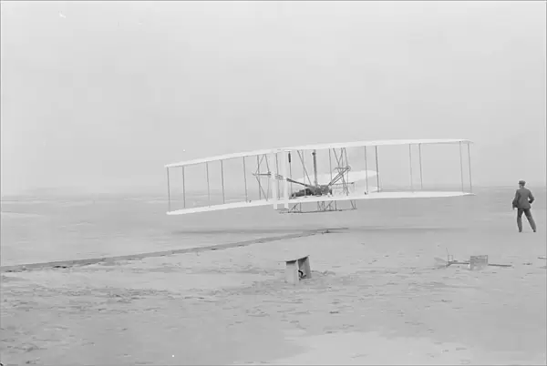 First flight, Kitty Hawk, North Carolina, 120 feet in 12 seconds, 10. 35am December 17th 1903 (b  /  w photo)