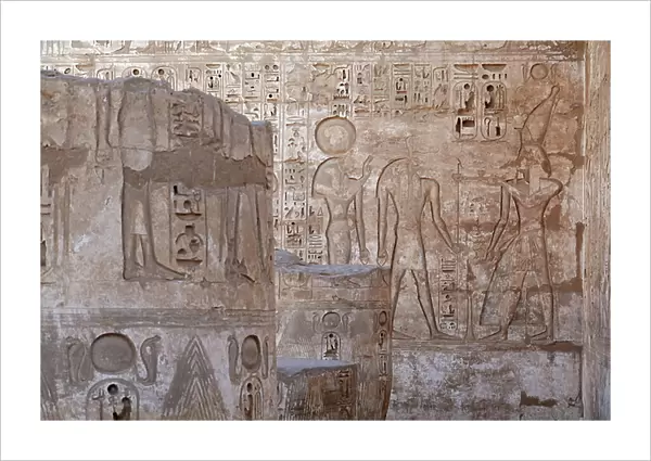 Ruler of Upper Egypt making an offering to Ra and Knoum, Temple of Horus, Edfu