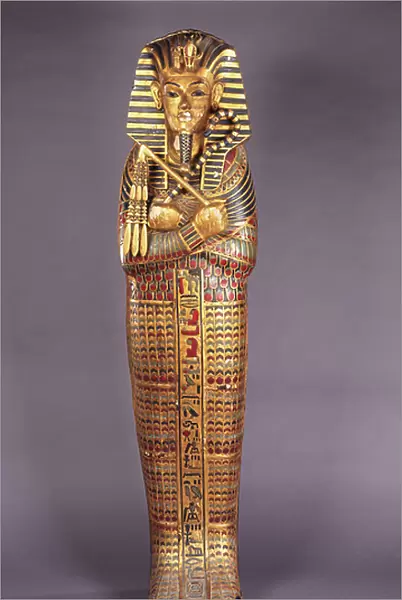 A gilt and polychrome painted wood model of the third coffin of King Tutankhamen, c.1930 (painted wood)