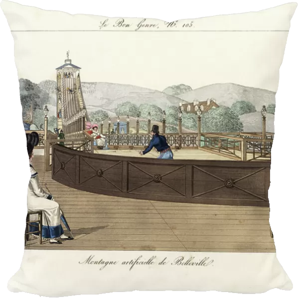 The roller coaster at Belleville with its five cars riding a distance of 600 feet in 9 or 10 seconds. A fashionable woman in plumed bonnet, shawl and parasol watches from the terrace