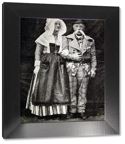 Photographic print of a husband and wife in traditional Norman costume