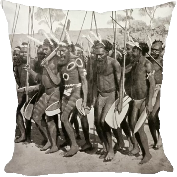 An avenging expedition by a northern tribe of Central Australia. The men danced just before leaving to take vengeance on another group of natives for the death of a relative