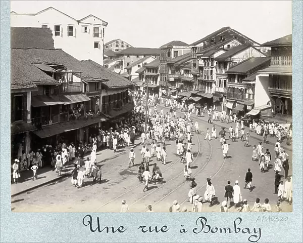 View of a street in Mumbai (India) with shops, population and tram rails - Second half photograph of the 19th century