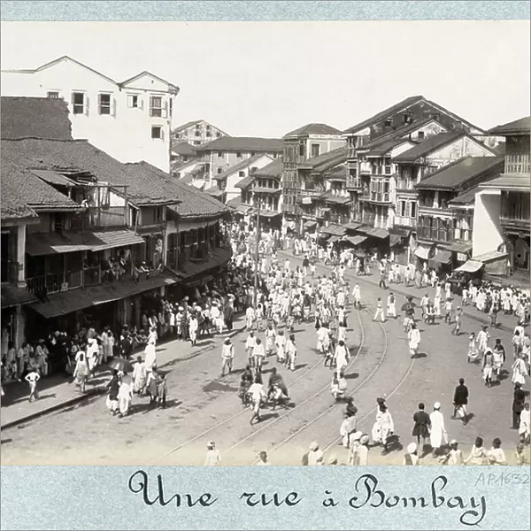 View of a street in Mumbai (India) with shops, population and tram rails - Second half photograph of the 19th century