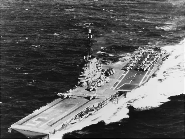 USS Randolph underway at sea with two S2F airplanes on its catapults, 1962