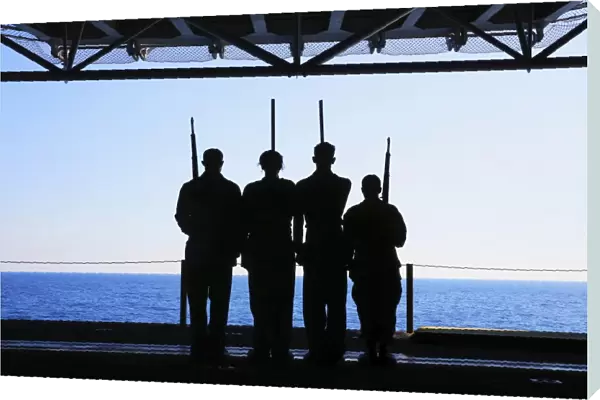 Sailors practice color guard drills aboard USS Kearsarge