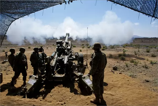 U. S. Marines fire the M777A2 Howitzer