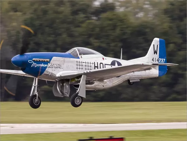 A P-51 Mustang takes off from Waukegan, Illinois