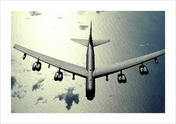 A B-52 Stratofortress in flight over the Pacific Ocean
