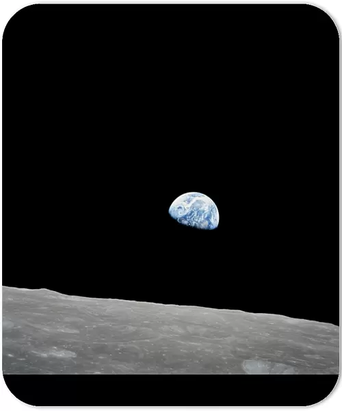 Earth rising above the lunar horizon
