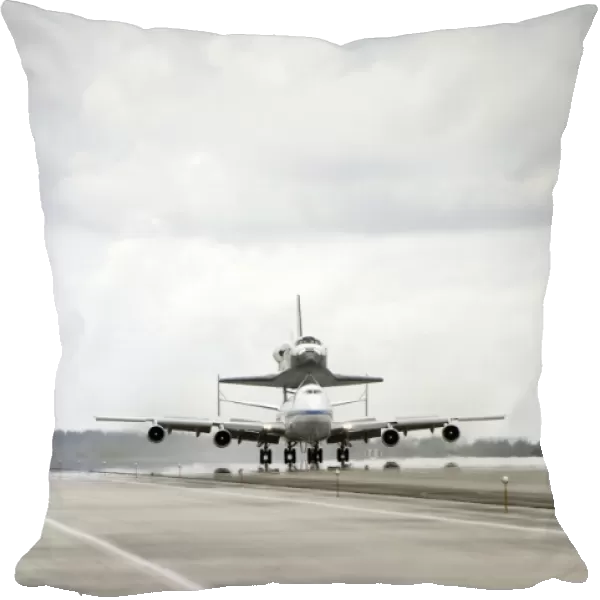 Space shuttle Discovery sits atop the Boeing 747 Shuttle Carrier Aircraft