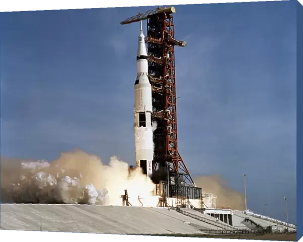 Apollo 11 space vehicle taking off from Kennedy Space Center