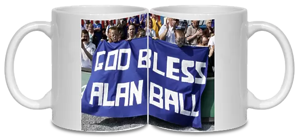 Everton v Manchester United Young Everton fans hold a banner to commemorate Alan Ball