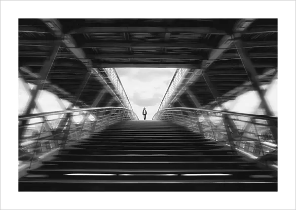 Alone walking on double bridge
