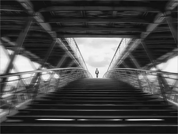 Alone walking on double bridge