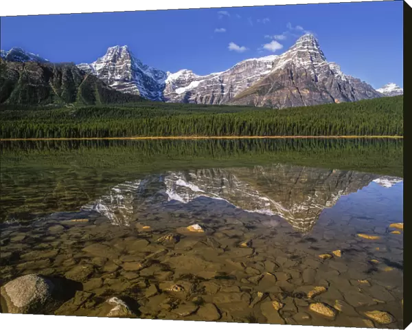 Canadian Rockies reflected in lake, Banff National Park, Alberta, Canada